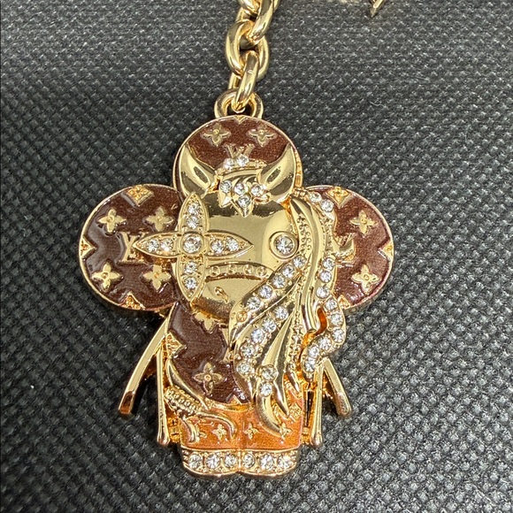 ✅ PRICE IS FIRM ✅ FASHION Gold and Brown Monogram Flower Bag Charm - Picture 2 of 3